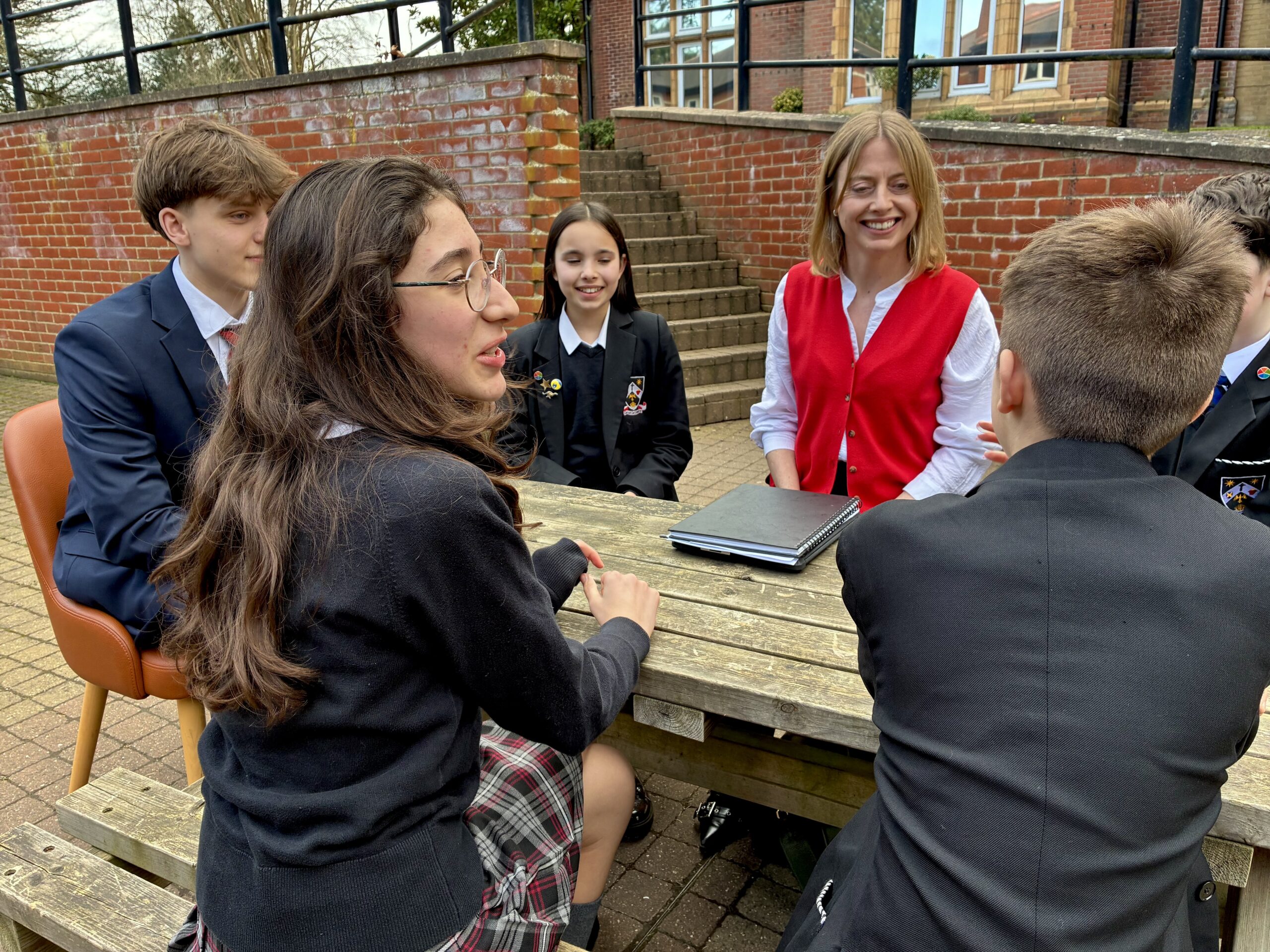 St Columba's College deputy head Katie Marson and pupils.