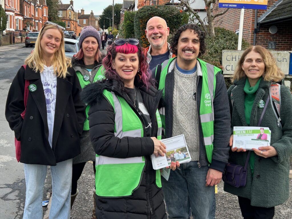 Sally Leonard campaigning with fellow Green Party members.