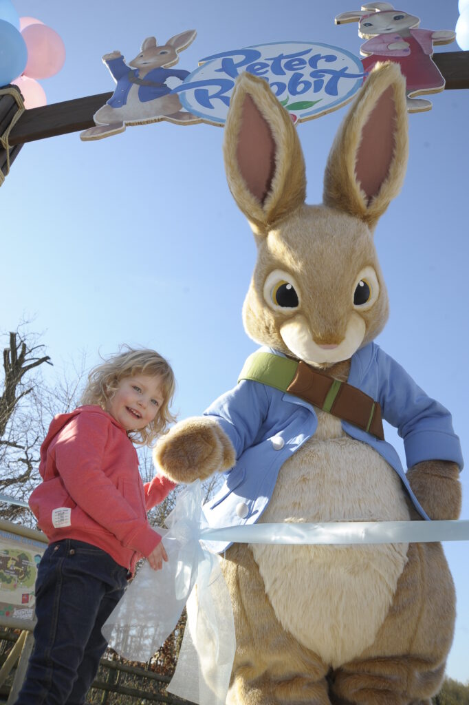 Jessica Nicholls, then aged three, helps Peter Rabbit open the new Peter Rabbit Adventure Playground at Willows Activity Farm in 2016.
