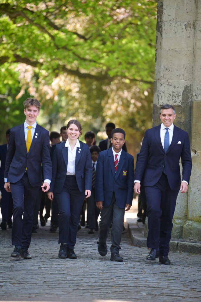 Joe Silvester, headteacher of St Albans School, with some of his pupils