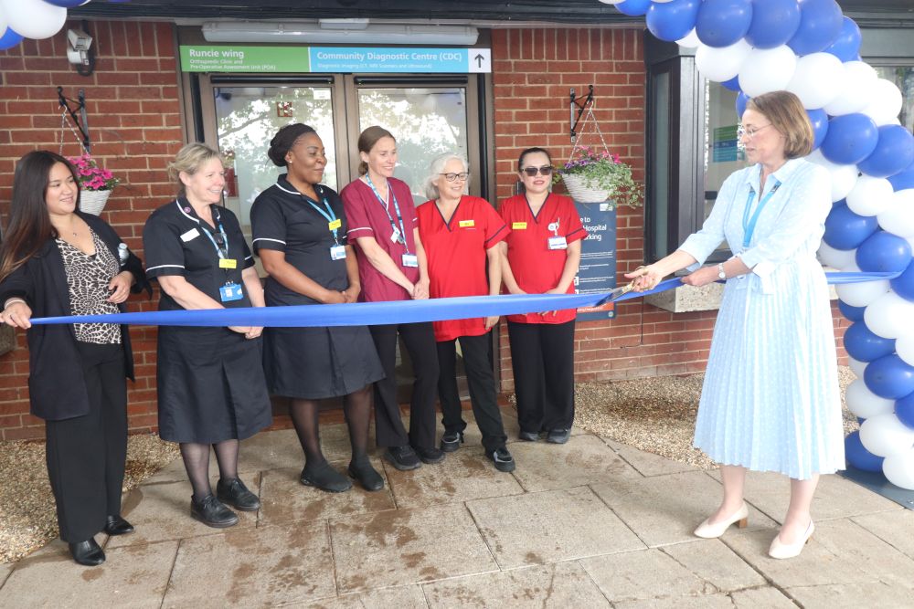 Cutting the ribbon at the CDC