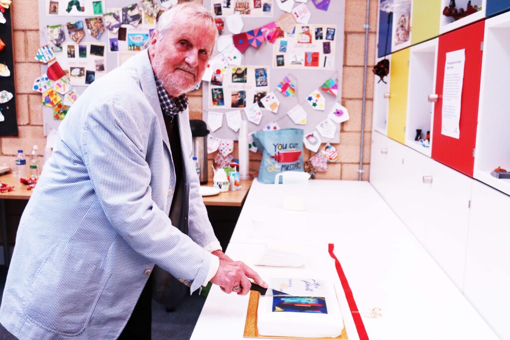 Ver Poets marked its 60th anniversary with a reading event, where President, John Mole, cut a cake