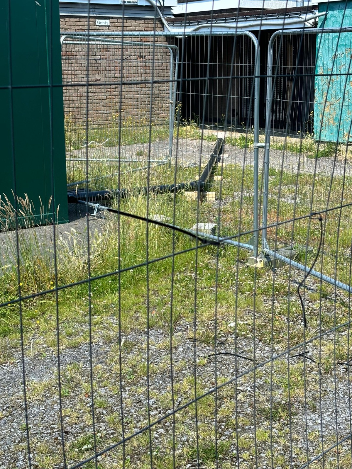 The derelict community centre site at New Greens