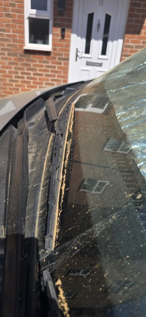 Dust on a resident's car.