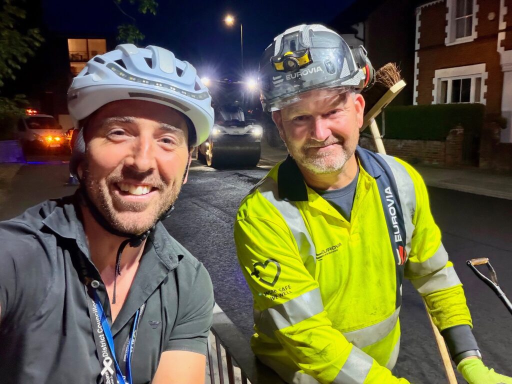 Cllr Matt Fisher (left) overseeing the resurfacing works being carried out by Eurovia.