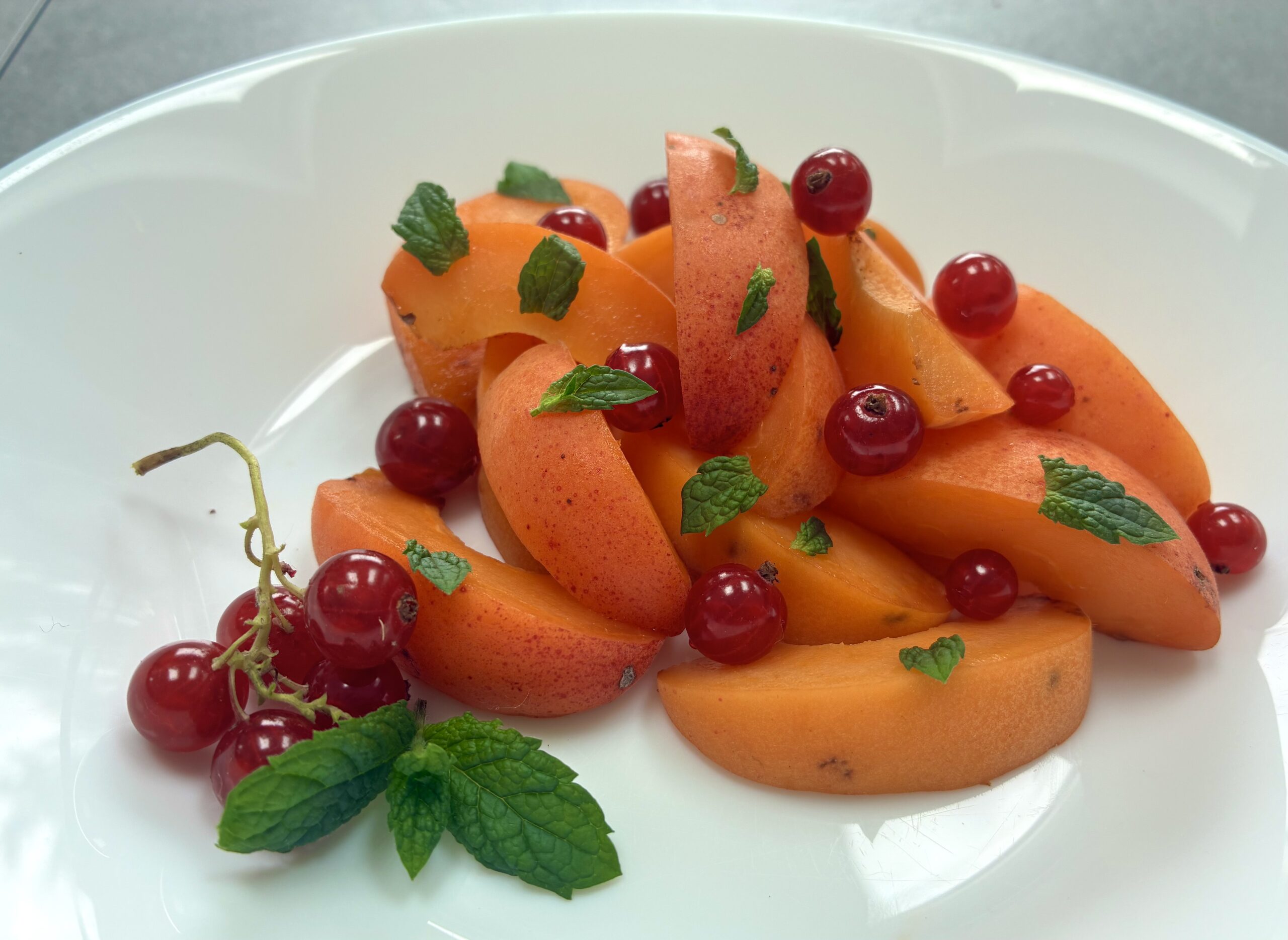 Apricot and redcurrant fruit salad