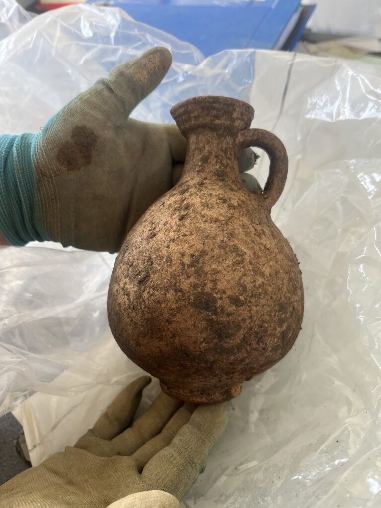 A locally made ring necked flagon from the Roman period. Flagons like this were made locally in the first and second centuries.