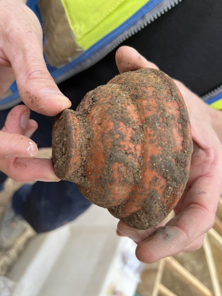 A Samian cup. Samina pottery was made in the provinces of Gaul (France) and Hispanoa (Spain) and exported across the Empire from the first to third centuries.