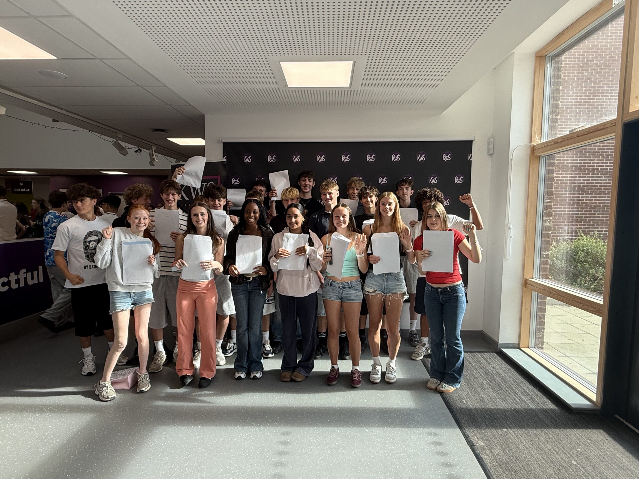 Happy faces at Katherine Warington GCSE results collection.