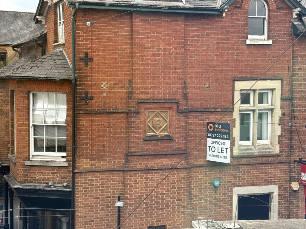 The Adey and White cartouche on the side of The Maltings
