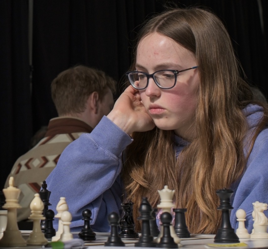 Emily Maton playing chess