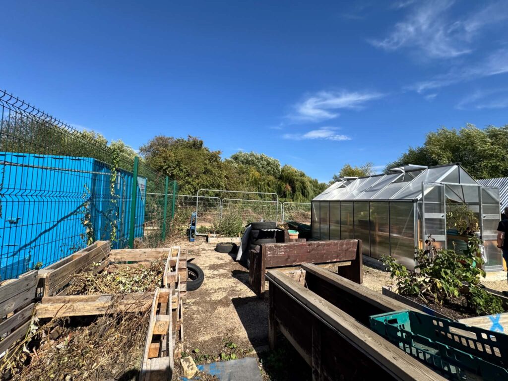 The path is next to the community allotments.