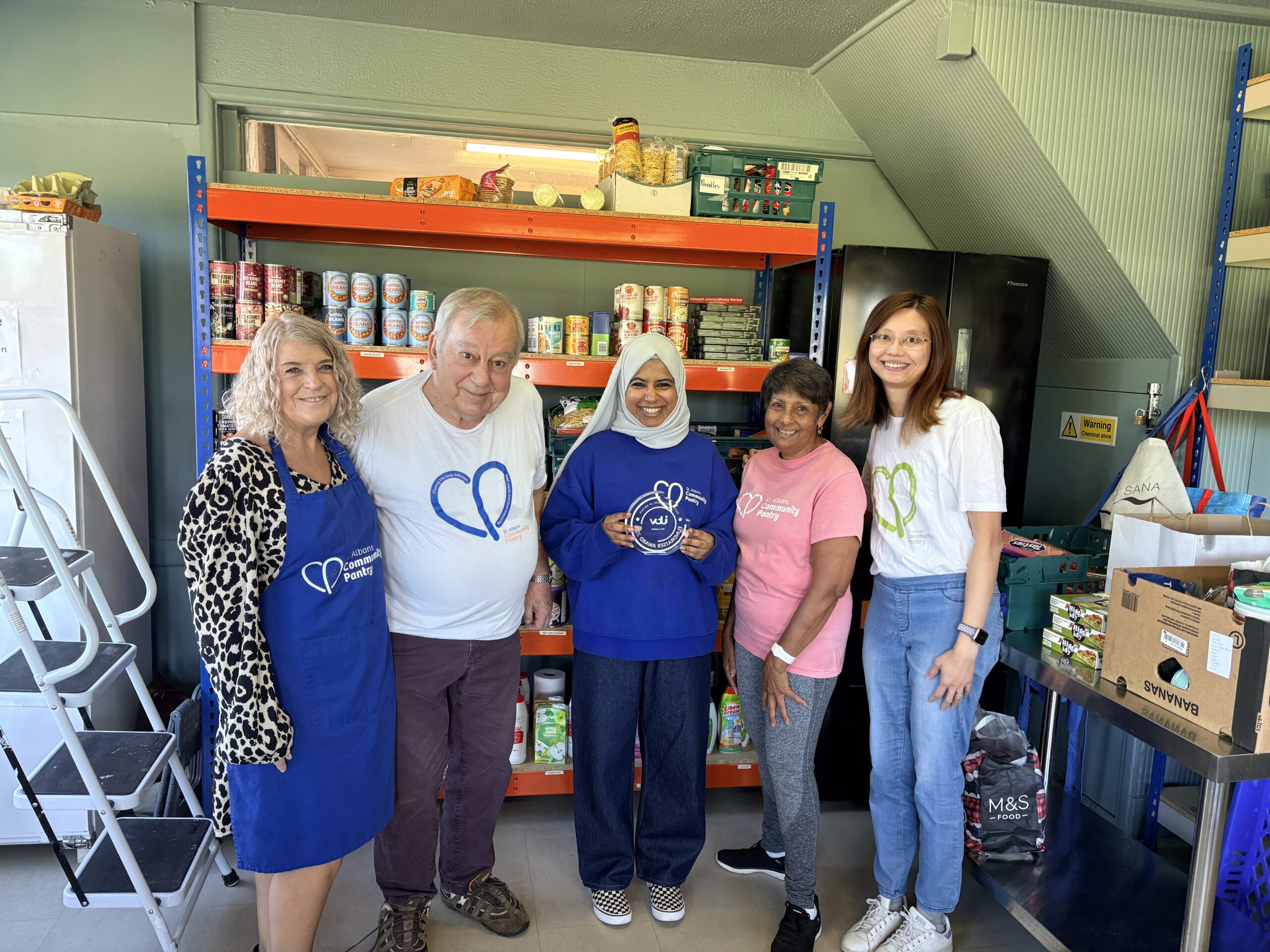 Raihaanah and volunteers at St Albans Community Pantry.