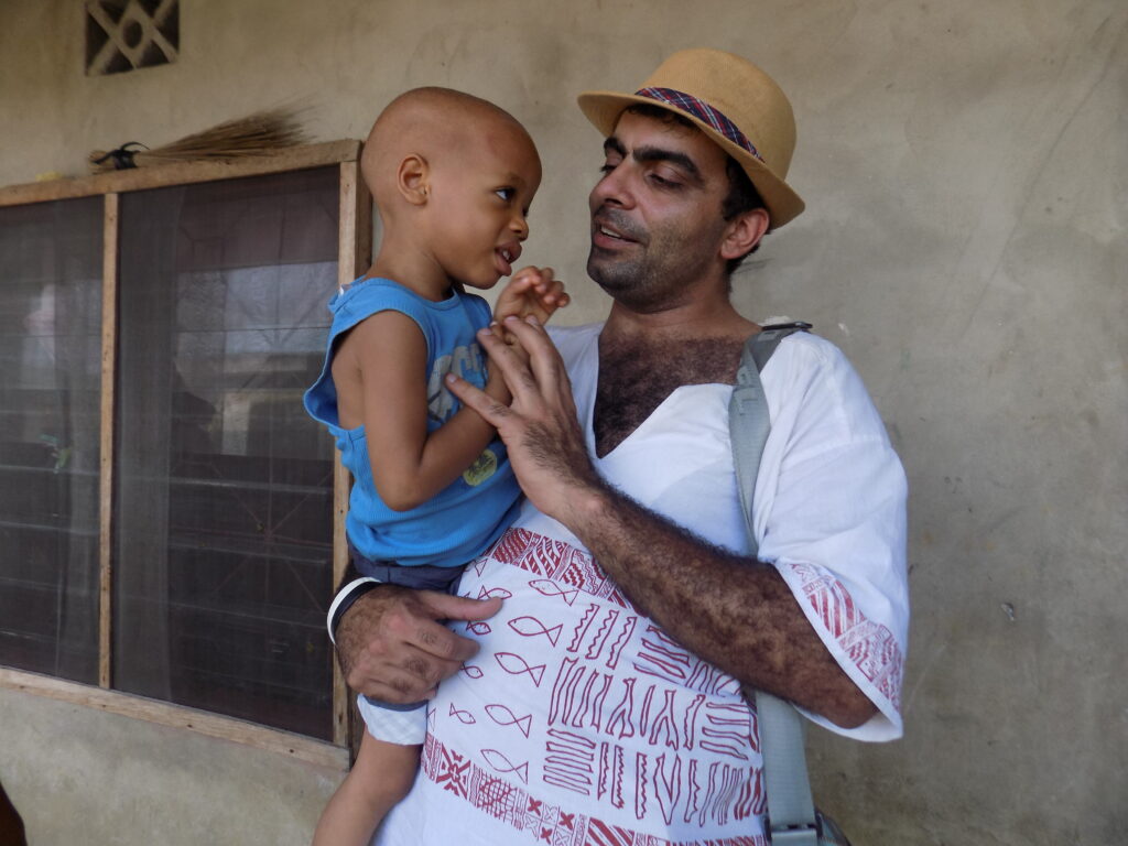 Leo and a baby featured in Nameless Children